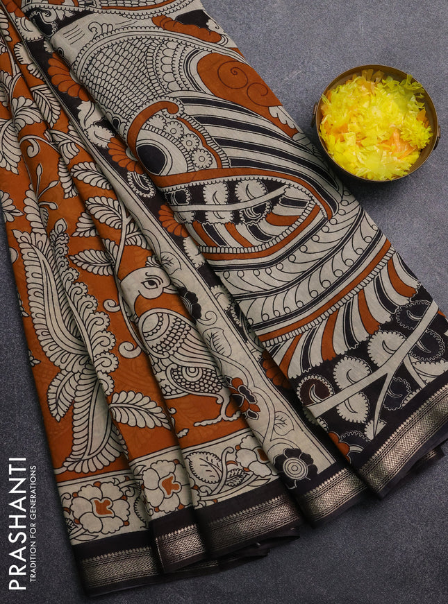 Muslin silk saree mustard yellow and black with allover kalamkari prints and zari woven border