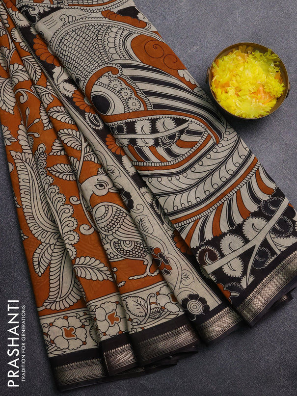 Muslin silk saree mustard yellow and black with allover kalamkari prints and zari woven border