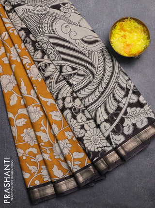Muslin silk saree mustard yellow and black with allover kalamkari prints and zari woven border
