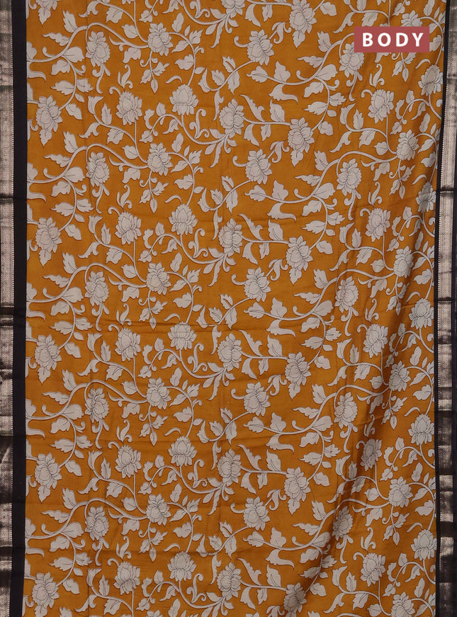Muslin silk saree mustard yellow and black with allover kalamkari prints and zari woven border