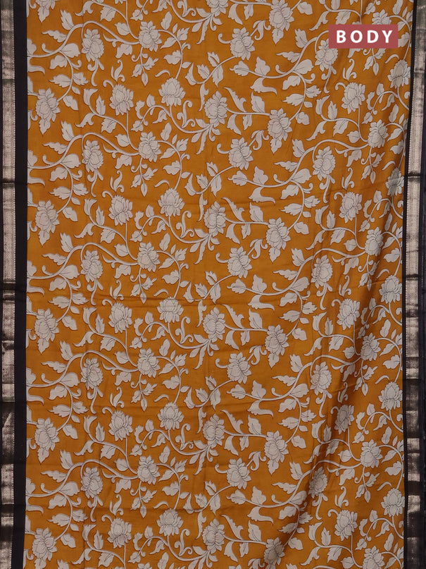 Muslin silk saree mustard yellow and black with allover kalamkari prints and zari woven border