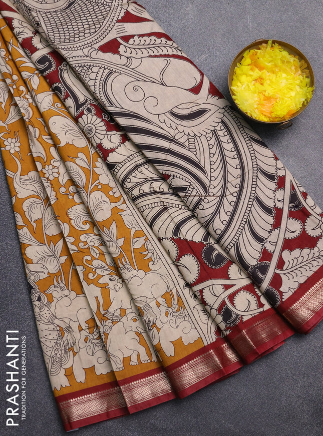 Muslin silk saree mustard yellow and maroon with allover kalamkari prints and zari woven border