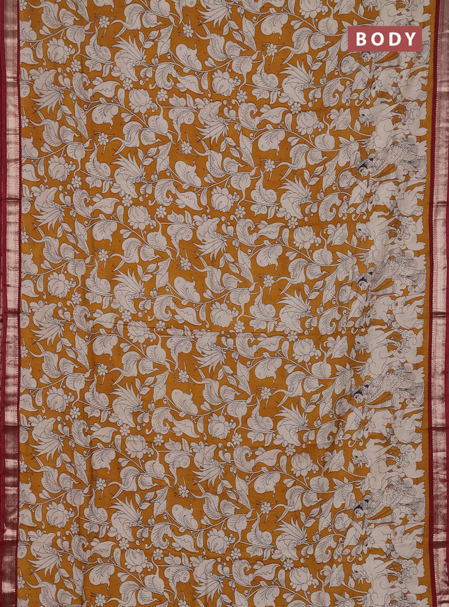 Muslin silk saree mustard yellow and maroon with allover kalamkari prints and zari woven border