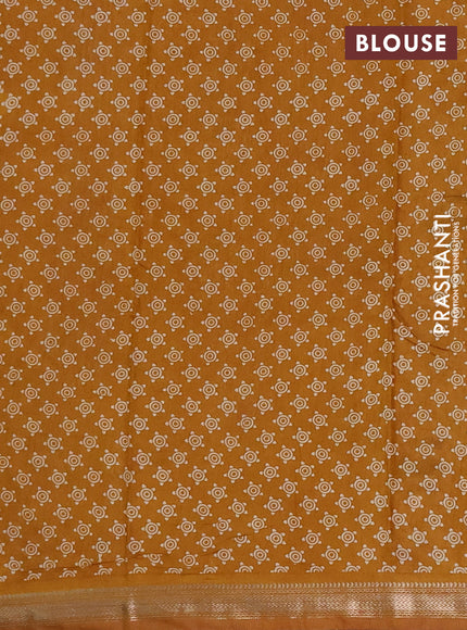 Muslin silk saree jamun shade and dark mustard with allover kalamkari prints and zari woven border