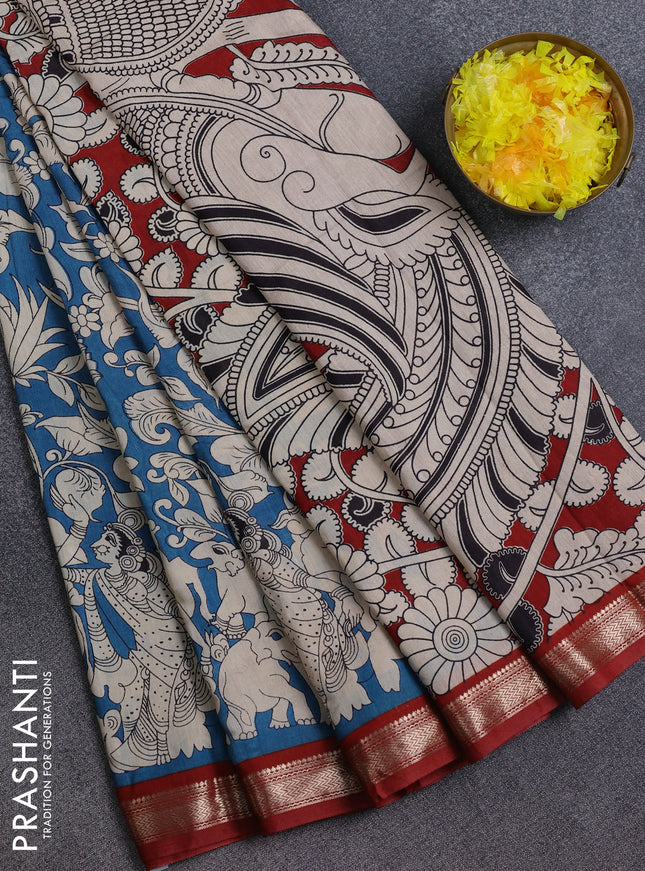 Muslin silk saree cs blue and rust shade with allover kalamkari prints and zari woven border