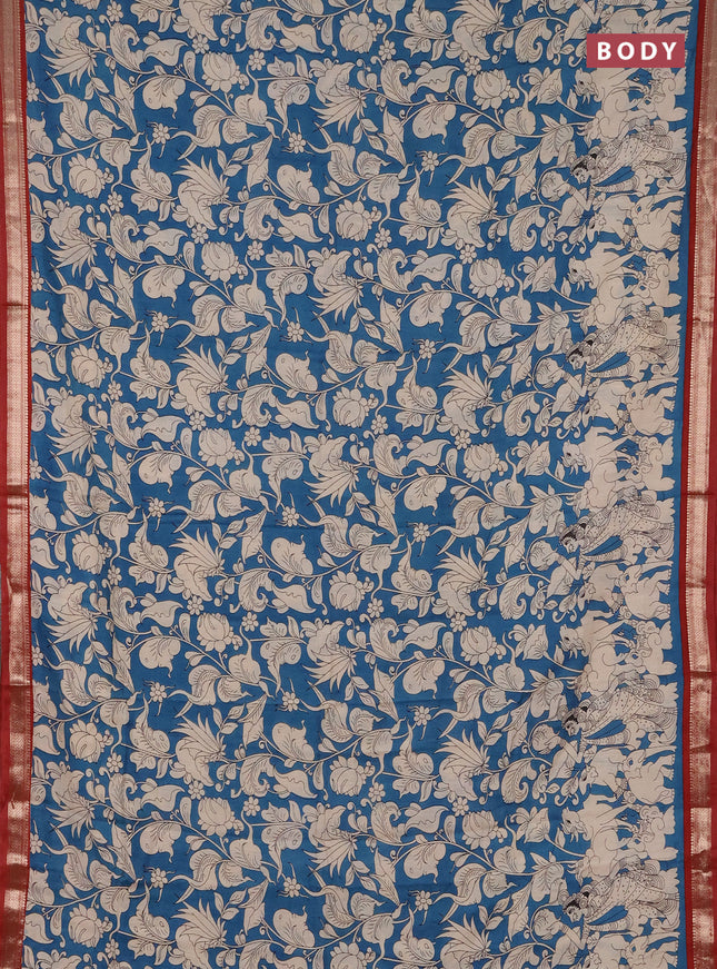 Muslin silk saree cs blue and rust shade with allover kalamkari prints and zari woven border