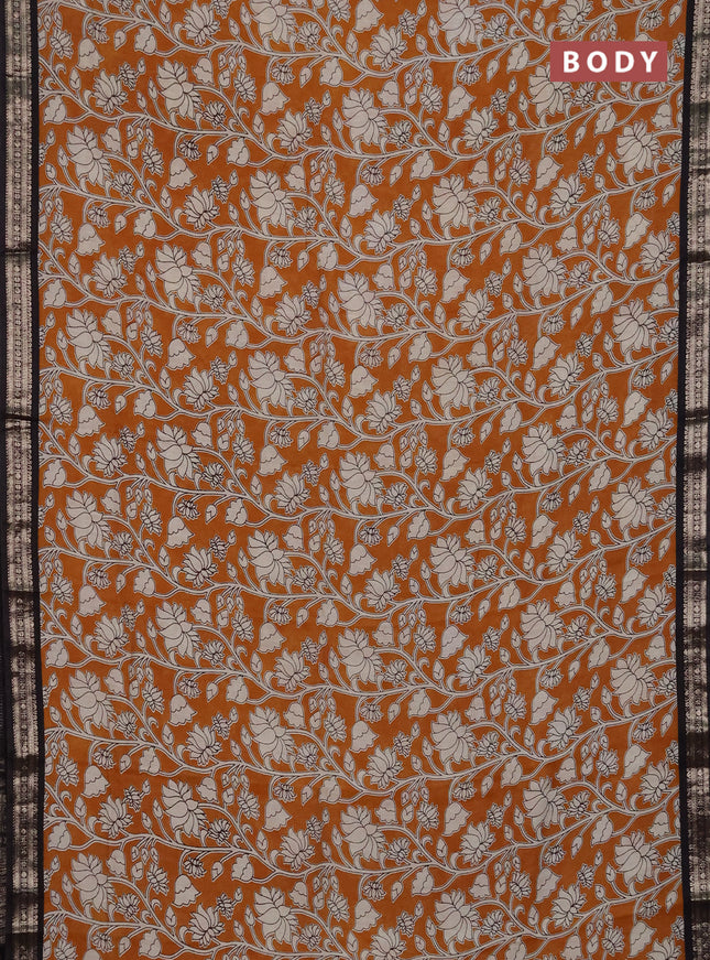 Muslin silk saree dark mustard and black with allover kalamkari prints and zari woven border