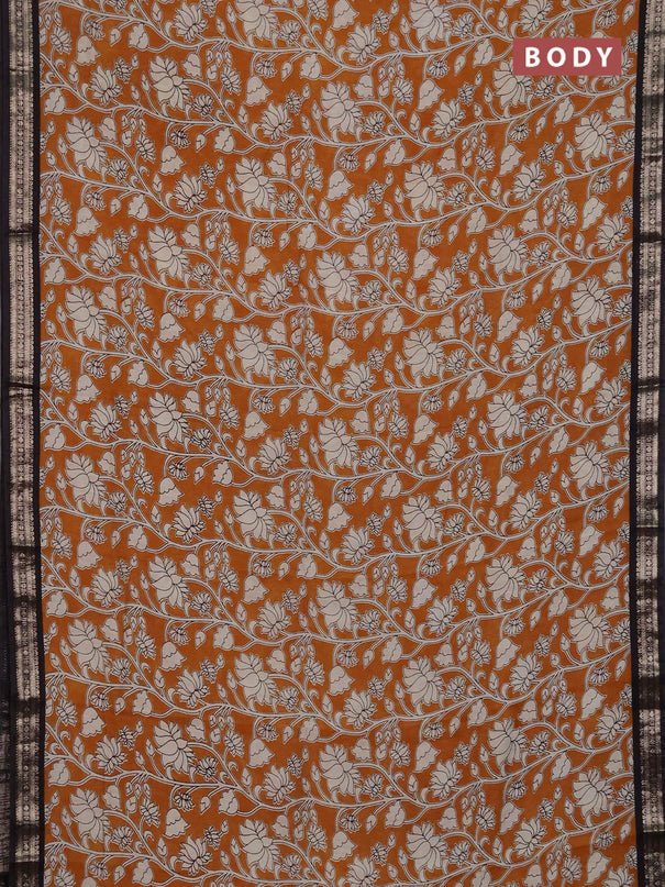 Muslin silk saree dark mustard and black with allover kalamkari prints and zari woven border