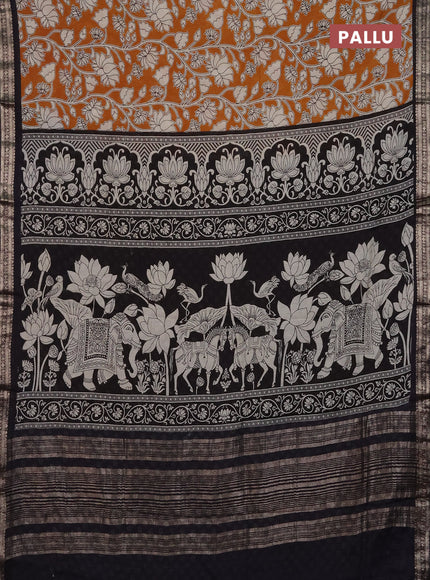 Muslin silk saree dark mustard and black with allover kalamkari prints and zari woven border