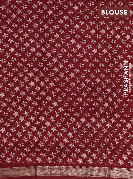 Muslin silk saree jamun shade and maroon with allover kalamkari prints and zari woven border