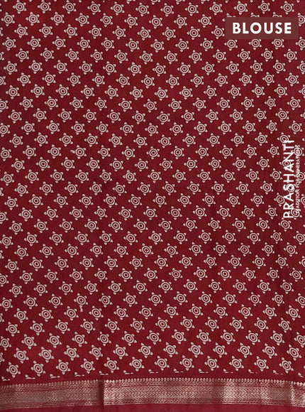 Muslin silk saree cs blue and maroon with allover kalamkari prints and zari woven border