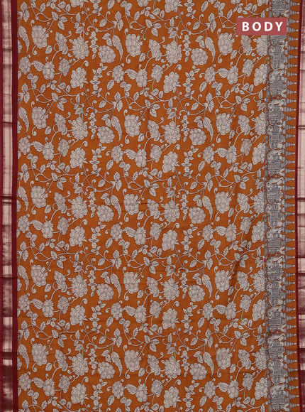 Muslin silk saree dark mustard and maroon with allover kalamkari prints and zari woven border