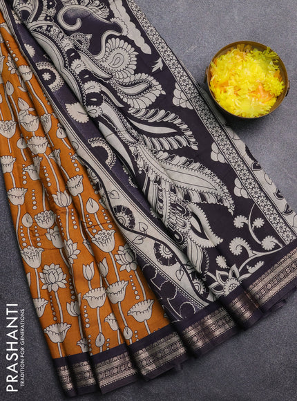 Muslin silk saree mustard yellow and black with allover kalamkari prints and zari woven border
