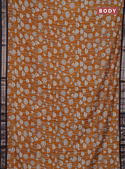 Muslin silk saree mustard yellow and black with allover kalamkari prints and zari woven border