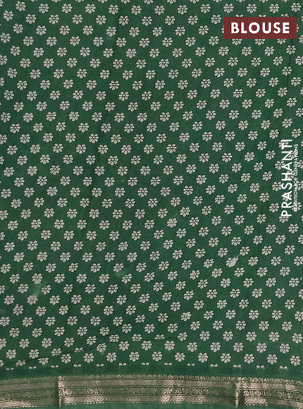 Muslin silk saree deep violet and green with allover kalamkari prints and zari woven border