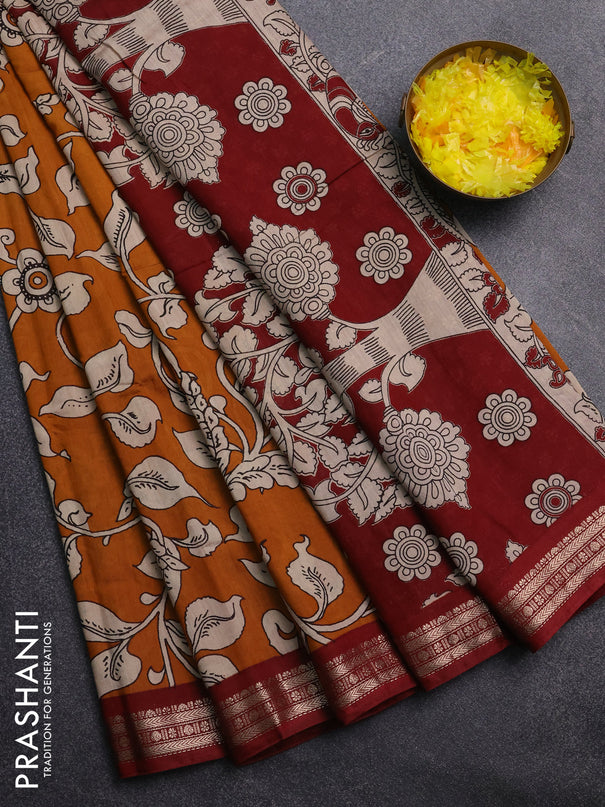 Muslin silk saree dark mustard and maroon with allover kalamkari prints and zari woven border