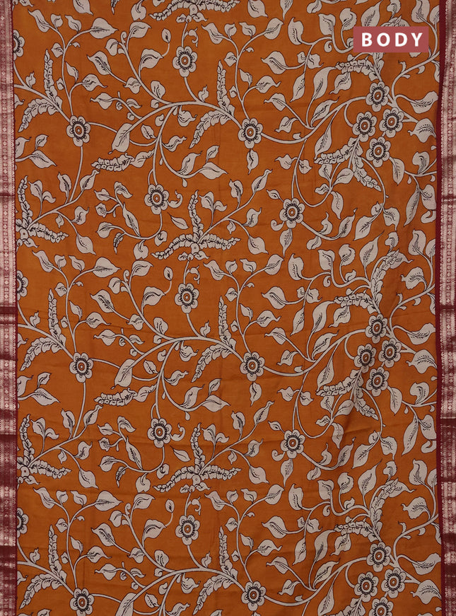 Muslin silk saree dark mustard and maroon with allover kalamkari prints and zari woven border