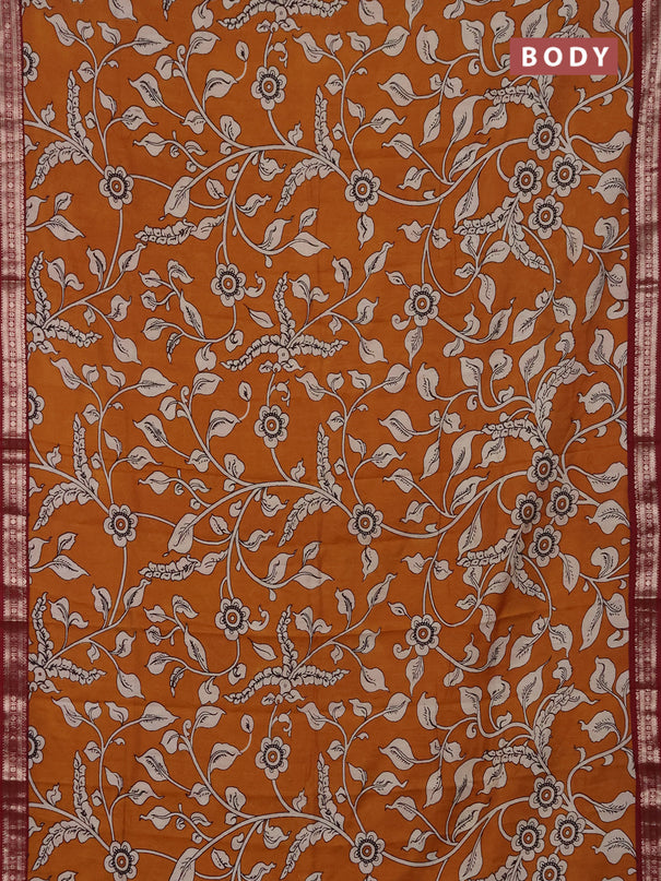 Muslin silk saree dark mustard and maroon with allover kalamkari prints and zari woven border