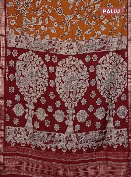 Muslin silk saree dark mustard and maroon with allover kalamkari prints and zari woven border