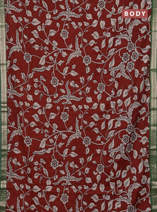Muslin silk saree rustic maroon and green with allover kalamkari prints and zari woven border