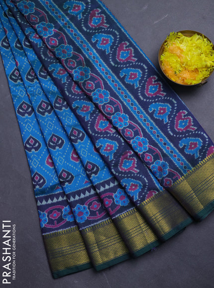 Semi tussar saree dual shade of bluish green and green with allover ikat prints and zari woven border