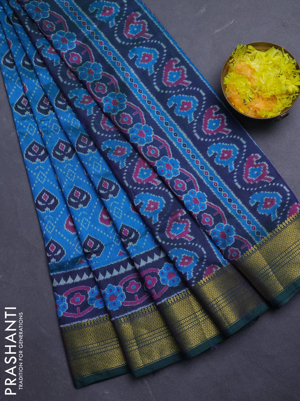 Semi tussar saree dual shade of bluish green and green with allover ikat prints and zari woven border