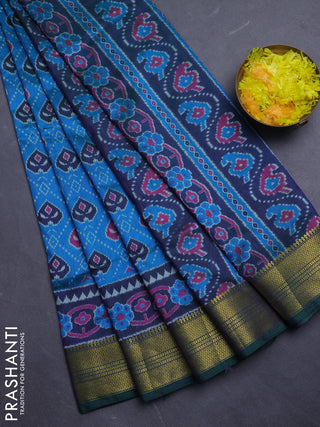 Semi tussar saree dual shade of bluish green and green with allover ikat prints and zari woven border