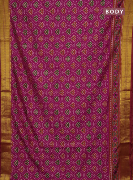Semi tussar saree pinkish orange and orange with allover ikat prints and zari woven border