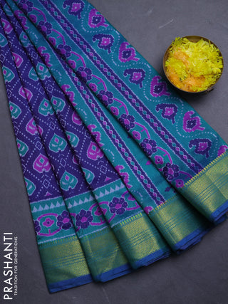Semi tussar saree blue and teal green with allover ikat prints and zari woven border