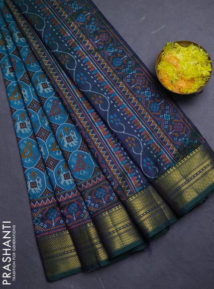 Semi tussar saree teal green and green with allover patola prints and zari woven border