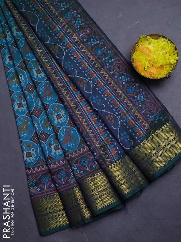 Semi tussar saree teal green and green with allover patola prints and zari woven border