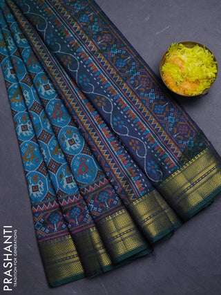 Semi tussar saree teal green and green with allover patola prints and zari woven border