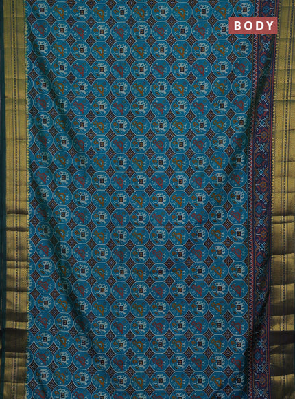 Semi tussar saree teal green and green with allover patola prints and zari woven border