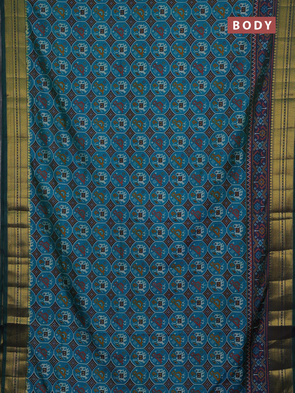 Semi tussar saree teal green and green with allover patola prints and zari woven border