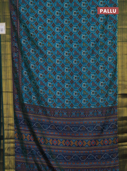Semi tussar saree teal green and green with allover patola prints and zari woven border