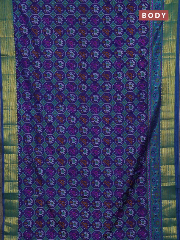 Semi tussar saree dark blue and teal green with allover patola prints and zari woven border