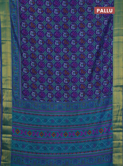 Semi tussar saree dark blue and teal green with allover patola prints and zari woven border