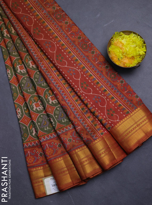 Semi tussar saree mehendi green and rust shade with allover patola prints and zari woven border