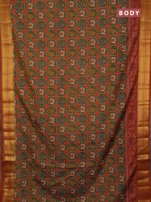 Semi tussar saree mehendi green and rust shade with allover patola prints and zari woven border