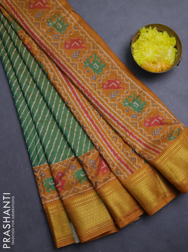 Semi tussar saree dual shade of green and dark mustard with allover leheriya style ikat weaves and zari woven border