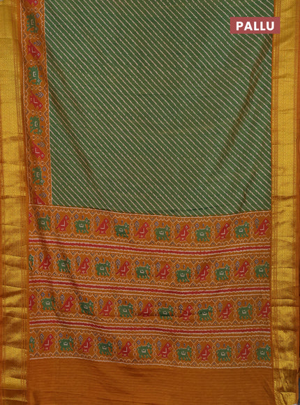 Semi tussar saree dual shade of green and dark mustard with allover leheriya style ikat weaves and zari woven border