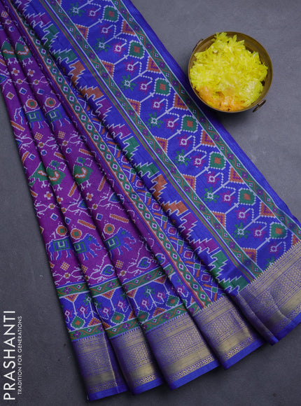 Semi tussar saree purple and blue with allover ikat prints and zari woven border