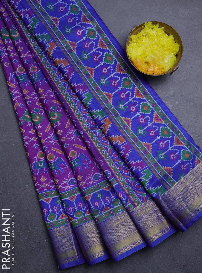 Semi tussar saree purple and blue with allover ikat prints and zari woven border