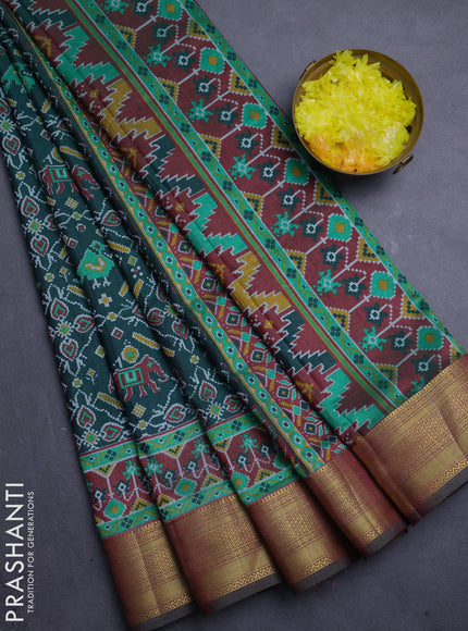 Semi tussar saree bottle green and pastel maroon with allover ikat prints and zari woven border