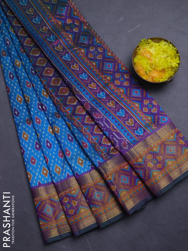 Semi tussar saree dual shade of bluish green and purple with allover ikat prints and ikat woven zari border