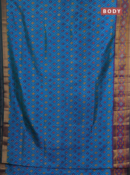 Semi tussar saree dual shade of bluish green and purple with allover ikat prints and ikat woven zari border
