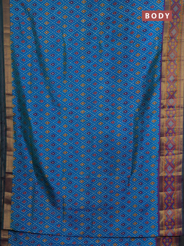 Semi tussar saree dual shade of bluish green and purple with allover ikat prints and ikat woven zari border