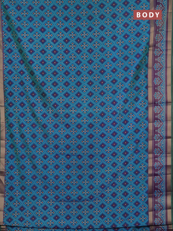 Semi tussar saree dual shade og bluish green and purple with allover ikat prints and ikat woven zari border