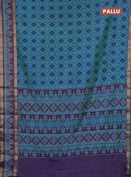 Semi tussar saree dual shade og bluish green and purple with allover ikat prints and ikat woven zari border
