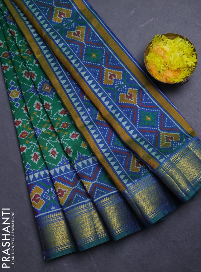 Semi tussar saree green with allover ikat prints and zari woven border